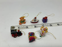 Load image into Gallery viewer, Itty, bitty, teeny tiny ornaments. Miniature tree ornaments. 1990s. Resin boat, train, teddy ear, present, etc.
