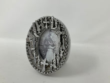 Load image into Gallery viewer, Vintage Oval Milagros Frame with image of Frida Kahlo inside. Silver tone charms.
