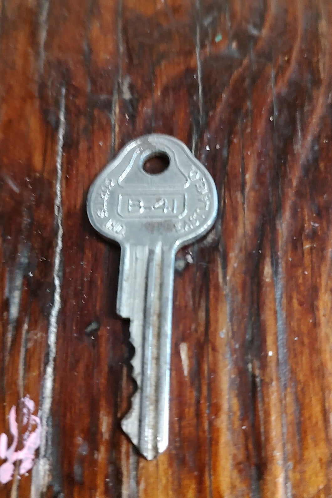 Old Curtis Knockout Key for GM vehicle. General Motors. Knockout still in place.