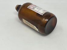 Load image into Gallery viewer, Antique Amber Bottle with Witch Powders Label.
