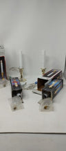 Load image into Gallery viewer, 4 Vintage Solid Brass Electric Candlestick Polished Window Candle Lamps In Boxes
