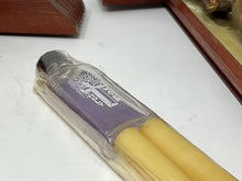 Load image into Gallery viewer, vintage wooden last rites crucifix with unopened, unused, holy water bottle and 2 candles.
