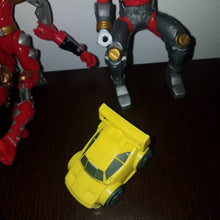 Load image into Gallery viewer, Vintage Collector&#39;s Lot of Action Figure Toys. Priced to sell mystery items. Transformers? Battle Bots? Superhero? Comics? I have no clue.
