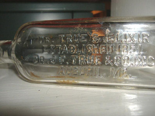 Antique Dr. True's Elixir Bottle. Auburn, ME. Clear Glass Embossed Quack Cure - Sloth Candle Co.