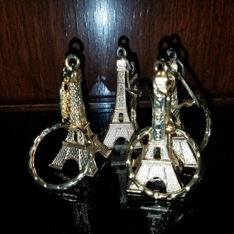 Choice of ONE 3D Eiffel Tower Metal Keychain. REPURPOSE! Cute. Gold Tone, Brass or Silver Tone Option. Make a Shabby Ornament or Shadow Box - Sloth Candle Co.