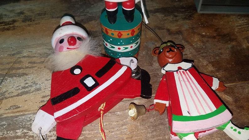 Vintage Pre-Owned Wooden Ornaments Wood Toys. Teddy Bear Mrs. Claus, Santa, push button base. Pull Toy Puppet Ornament.