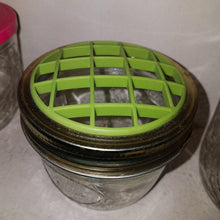 Load image into Gallery viewer, Vintage small canning jar flower frog. Green plastic flower frog lid. 1 cup size Jelly Jar.
